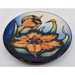 A Moorcroft Spiraxia large coaster designed by Emma Bossons, date 1999, 16cm diam Condition