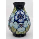 A Moorcroft Tudor Rose vase designed by Sally Tuffin, date 26.11.1992, signed by J Moorcroft, approx