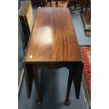 A George III mahogany drop leaf table, late 18th Century, fitted with a single drawer, having two