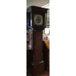 A George III oak and mahogany cross-banded longcase clock, the hood with a projected cornice, the