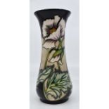 Moorcroft: A Moorcroft four star members 'White Poppies' baluster vase, no 83. Height approx 21cm.