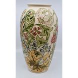 Moorcroft: A Moorcroft vase decorated in the William Morris 'Garden Lily' design on ivory. Height