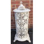 A 19th Century style cast iron white painted Belgium stove, 20th Century, scrolled pierced