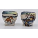 Moorcroft: 2 Moorcroft 'Woodside Farm' egg cups by Anji Davenport, both marked Trial. Height