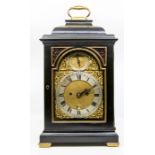 A George III ebonised and brass mounted eight day bracket clock signed by on the dial and