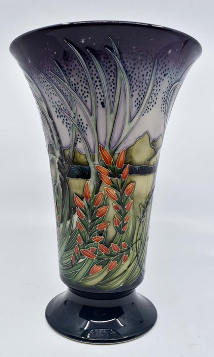 Moorcroft: A Moorcroft Collectors Club 'Roig' pattern fluted vase. Height approx 22.5cm. Marks to