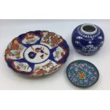 A group of Chinese Imari including charger and plates, painted with floral decoration in various