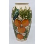 Moorcroft: A Moorcroft 'Oranges' vase by Sally Tuffin, 1989. Height approx 25.5cm. Marks to base.