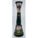 Moorcroft: A Moorcroft Limited Edition 'Rosebuds' vase by Philip Gibson, no 146 of 250. Height