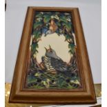 A Moorcroft framed oblong plaque depicting a Cuckoo, designed by Phillip Gibson, date 2005, the