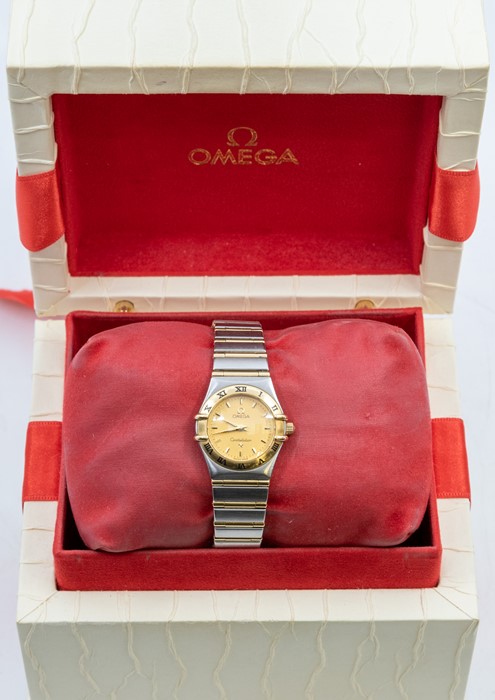 Omega- a ladies Omega constellation bi colour wristwatch, round gold tone textured dial, baton