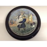 A Prattware pot lid cover titled Landing the Fare, Pegwell Bay, the lady wears a white dress with