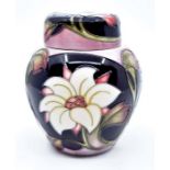 A Moorcroft Winter ginger jar and cover, rose and lilac colour, 4" high  Conditon Report: good no