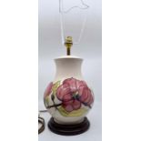 Moorcroft: A Moorcroft 'Magnolia' lamp base and shade. Height approx 26.5cm, total height approx