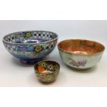 A group of three Lustre ware bowls to include: Maling pattern no: 6410 blue ground decorated with