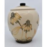 Moorcroft: A Moorcroft 'Coneflower' jar and cover. Height approx 15cm. Marks to base. Condition: