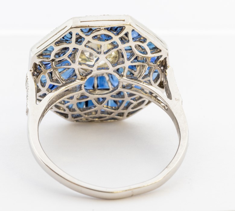 An Art Deco style sapphire and diamond platinum set cocktail ring, comprising a central rub-over set - Image 3 of 3