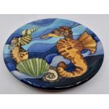 A Moorcroft Seahorse plate designed by Jeanne MacDougall, date 1997, 26cm diam, box and sleeve
