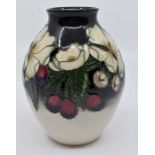 A Moorcroft Christmas Pride vase, trial piece dated 2009, 15cm high Condition Report: Tiny scuff