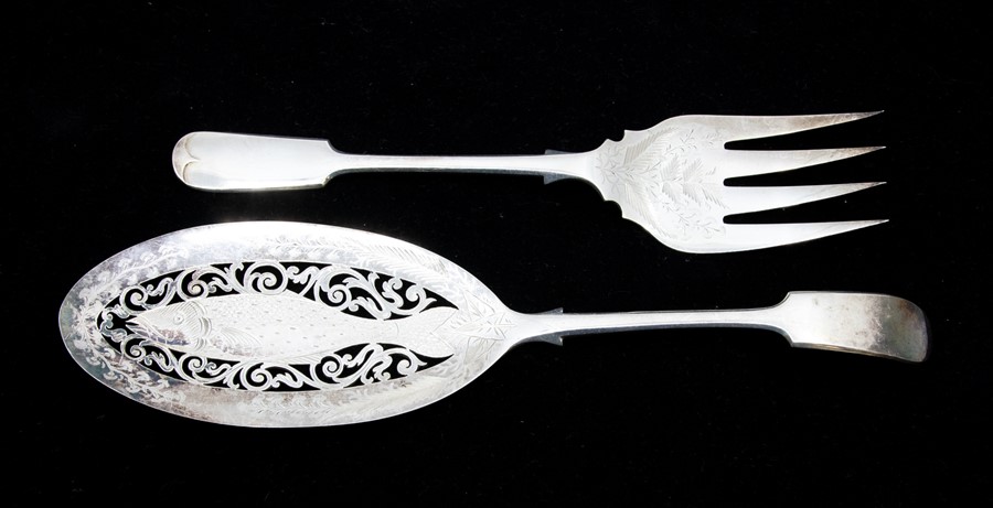 A pair of Georgian style Prince's Plate fish servers the oval blade engraved with fish within wavy