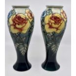 A pair of Moorcroft Roses vases designed by Sally Tuffin, date 1994, 17.5cm high, boxed Condition