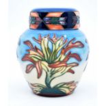 Moorcroft: A Moorcroft 'Indian Paintbrush' pattern small ginger jar. Height approx 11cm. Marks to