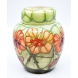 Moorcroft: A Moorcroft Collectors Club 'Nasturtium' ginger jar. Height approx 16cm. Marks to base.