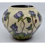 A Moorcroft Hepatica posy vase designed by Emma Bossons, date 2000, 12.5cm high Condition Report: