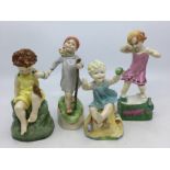 A group of four from the Royal Worcester Children of the Week series to include:  Wednesday Child