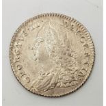 A 1757 George II silver sixpence, old laureate bust, (EF)