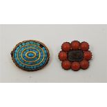 A 19th century precious yellow metal and coral mourning brooch, set eight cabochon coral with
