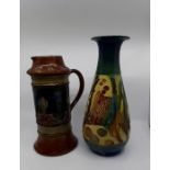 An art pottery Doulton jug and Branham pottery vase, restoration to top
