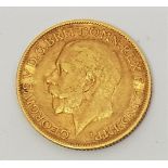 **AWAY**A 1912 George V gold sovereign, London mint.