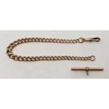 A 9ct. rose gold Albert chain, formed from graduated curb links (T bar loose). (21.9g)