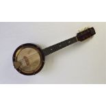 A John Grey & Son ukulele, with case en suite.