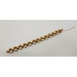 A gentleman's 9ct. gold link bracelet, (one or more links lacking, as found). (30.2g)