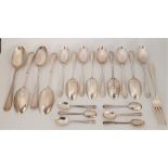 A large collection of silver flatware, to include: Four silver 'rat tail' pattern table spoons,