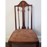 A set of three Continental Art Nouveau mahogany side chairs in the style of Liberty, early 20th