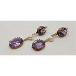 A pair of antique precious yellow metal, amethyst and pearl drop earrings, each having wire hook