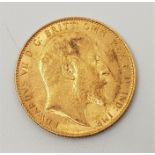 A 1910 Edward VII gold sovereign, London mint.