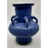 An early Chinese high fired vase, possibly Yuan dynasty, bearing wax seal mark to the vase, faults