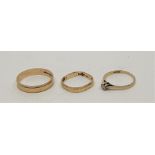 A 9ct. gold band, with engine turned edges, together with another 9ct. gold band, of octagonal form,