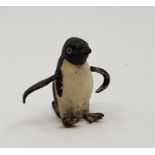 An early 20th cntury cold painted bronze of a penguin, height 40mm.