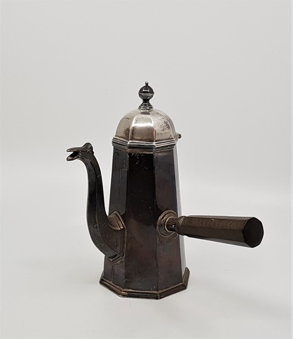 A silver octagonal chocolate/coffee pot, in the Queen Anna style, by Willaim Hutton & Sons Ltd,