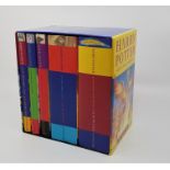 Rowling (J.K), a signed box set of Harry Potter books in single five volume publishers card slip