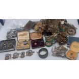 A large collection of yellow metal costume jewellery, to include yellow metal studs and a quantity