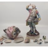 A pair of Meissen style porcelain figures