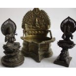 A Sino Tibetan bronze candle holder together with two Buddhas (3)