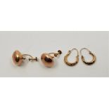 A pair of 9ct. yellow gold faceted hoop earrings, together with a pair of 9ct. rose gold earrings,