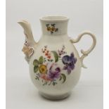 A Meissen style porcelain jug, with mask head spout, hand painted in colours, height 13cm.